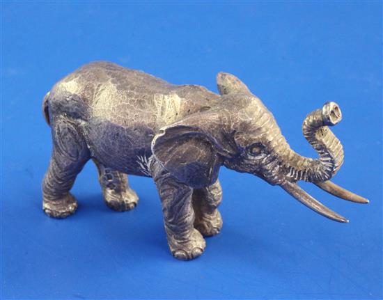 A 1980s silver miniature free standing model of an Indian elephant by John Silvant & Margurite Jones, 4.5 oz.